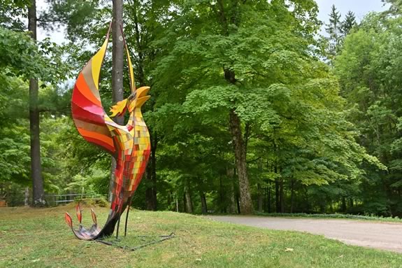 Pingree School in Hmailton Massachusetts hosts their annual Flying Horse Outdoor Sculpture exhibit each Fall. Sculpture: Phoenix by Robin Tost.