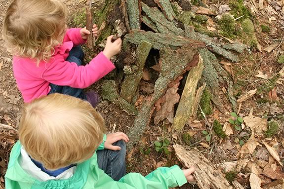 Kids are welcomed to Ravenswood PArk to experiment with building fairy houses! 