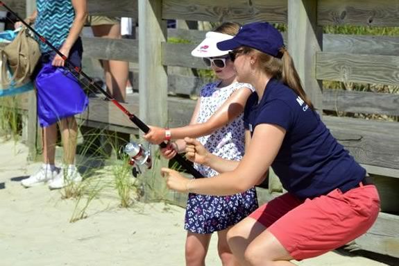 Paul Hogg, the Newburyport Harbormaster, and Maren Olsen, Massachusetts Division of Marine Fisheries Angler Education Program