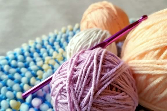Kids learn the basics of crochet knitting each Tuesday at the Abbot Public Library in Marblehead Massachusetts