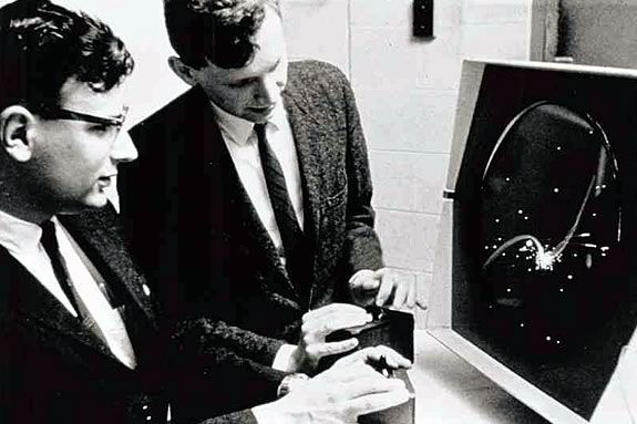 Dan Edwards and Pete Samson play Spacewar! at MIT in 1962. 