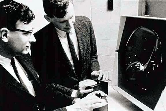 Dan Edwards and Pete Samson play Spacewar! at MIT in 1962. Spacewar! is regarded as a ground breaking step in the world of fully digital interactive gaming! Dan Edwards and Pete Samson play Spacewar! at MIT in 1962.