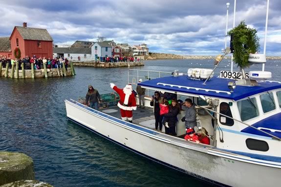 Santa comes to Rockport Ma by lobster boat to kick off the Holiday season in Rockport Massachusetts! Santa comes to Rockport Ma by lobster boat to kick off the Holiday season in Rockport Massachusetts!